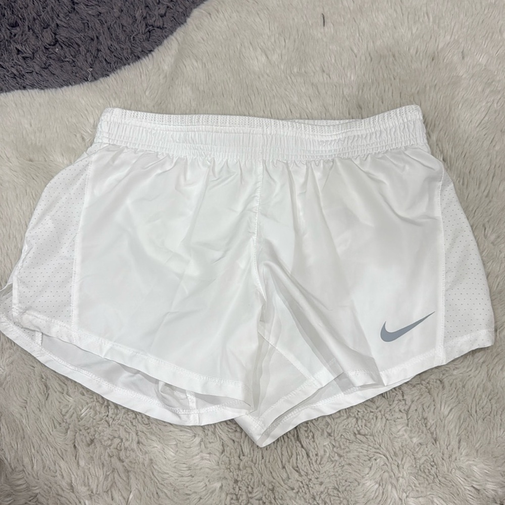 white nike running shorts